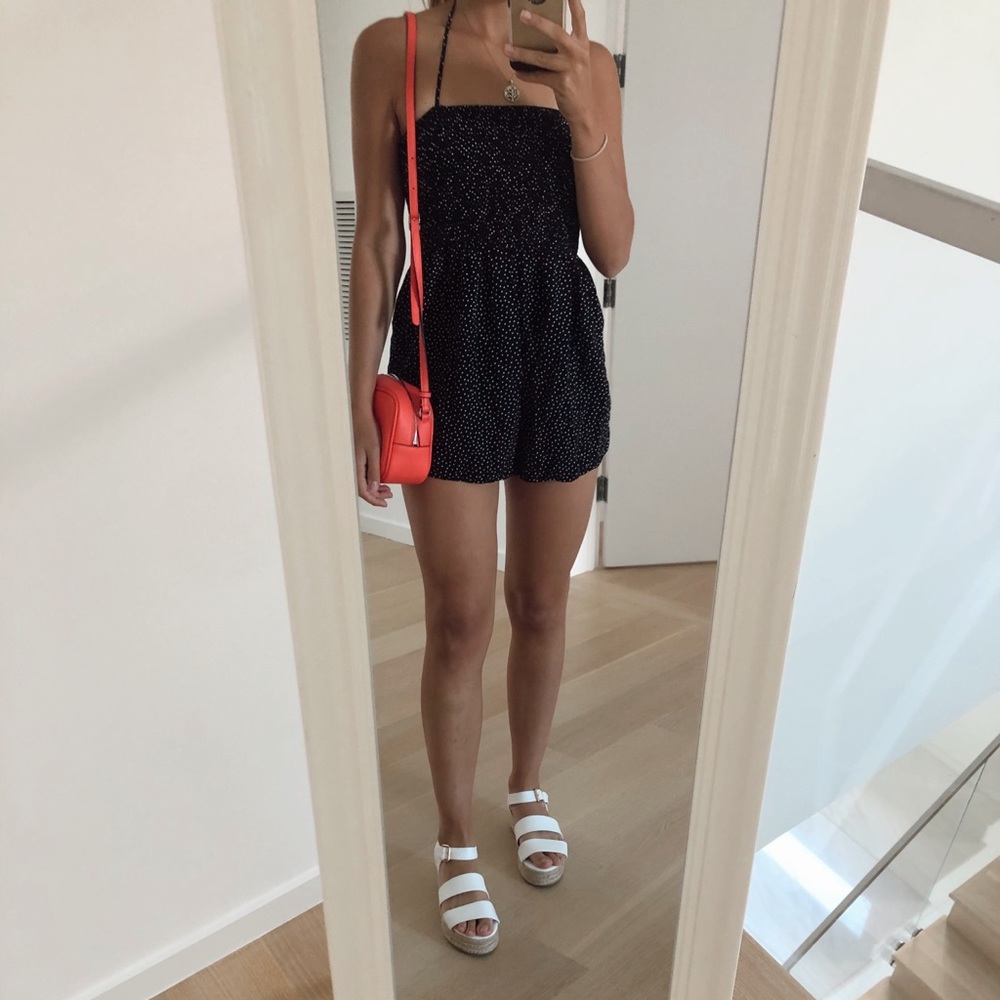 Black polka dots short romper. Size S